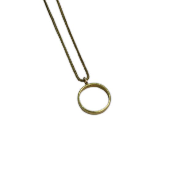 gold wedding ring as pendent on necklace