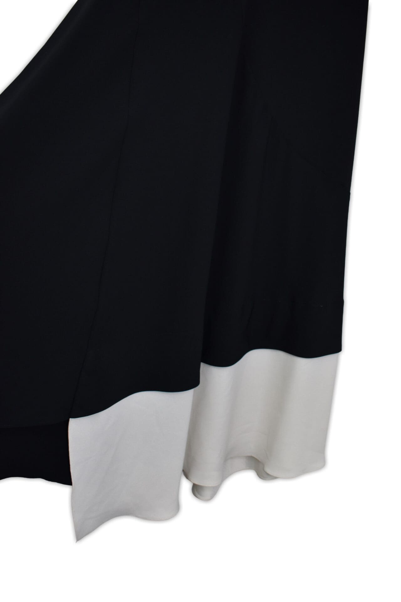 Crew neck, asymmetric skirt design