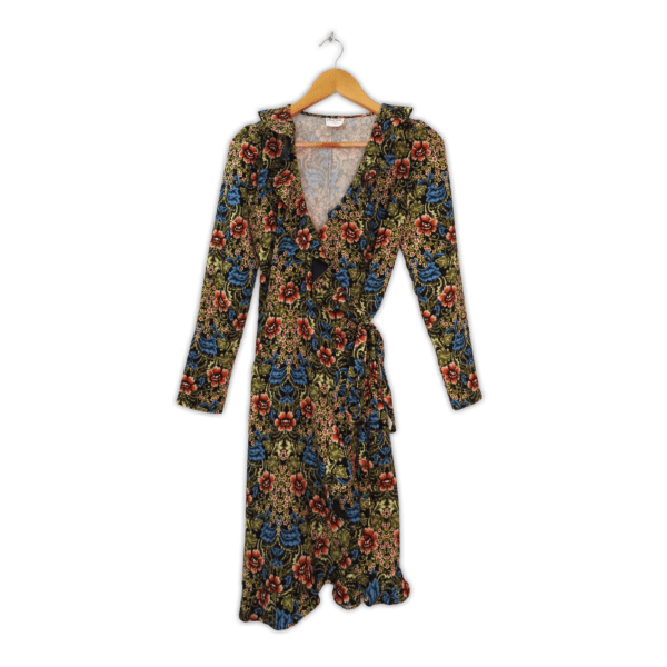 This mid floral length dress features a fit and flare silhouette, faux wrap with tucks under bust and a self-tie sash. Made in Australia.