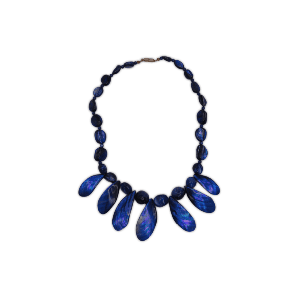Blue Necklace with small beads, stones and Pāua like shells. Also features a brass column screw clasp to close. Stones and beads on the necklace vary in sizing and weight along with different shades of blue.