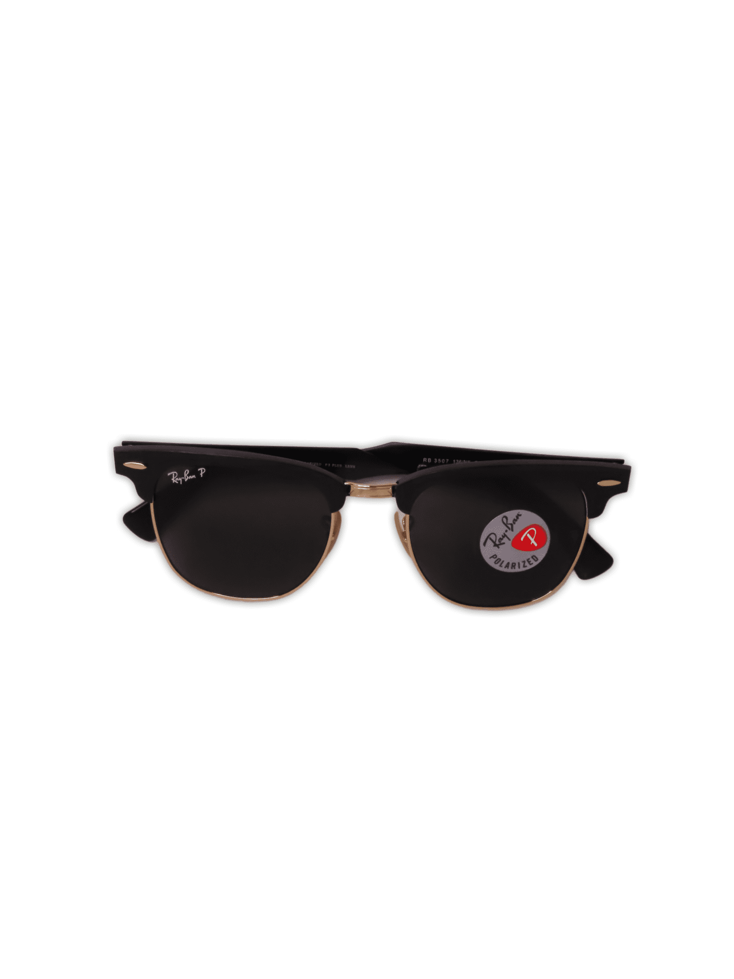 Never fail to make a statement with the Ray-Ban Clubmaster Polarized sunglasses. Inspired by the 50’s, the unmistakable design of the Clubmaster Classic is worn by cultural intellectuals, those who lead the changed tomorrow. Made from Acetate with lens made from glass and features a Black Frame with Metal detail elements. 