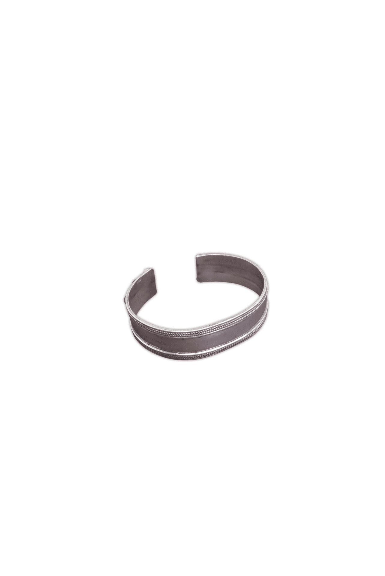 Sterling silver cuff bangle featuring intricate designs on the rim and near edges of bangle.