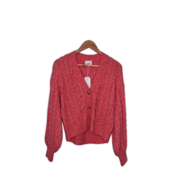 Crafted from a premium blend with wool and alpaca, this cardigan is soft, comfortable, and stylish. It features pom pom details and braided cables, with a V neck leading into a cropped length. Fabric: 50% Wool, 33% Nylon, 17% Alpaca Colour: Rose Size: XS