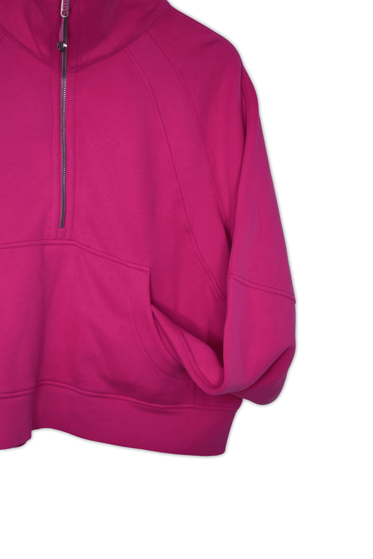 A scuba oversized funnel neck from lululemon, cropped at the waist featuring a kangaroo pocket with hidden sleeve, elastic zipper which doubles as an emergence hair tie, and zipper garage to stop any chafing.