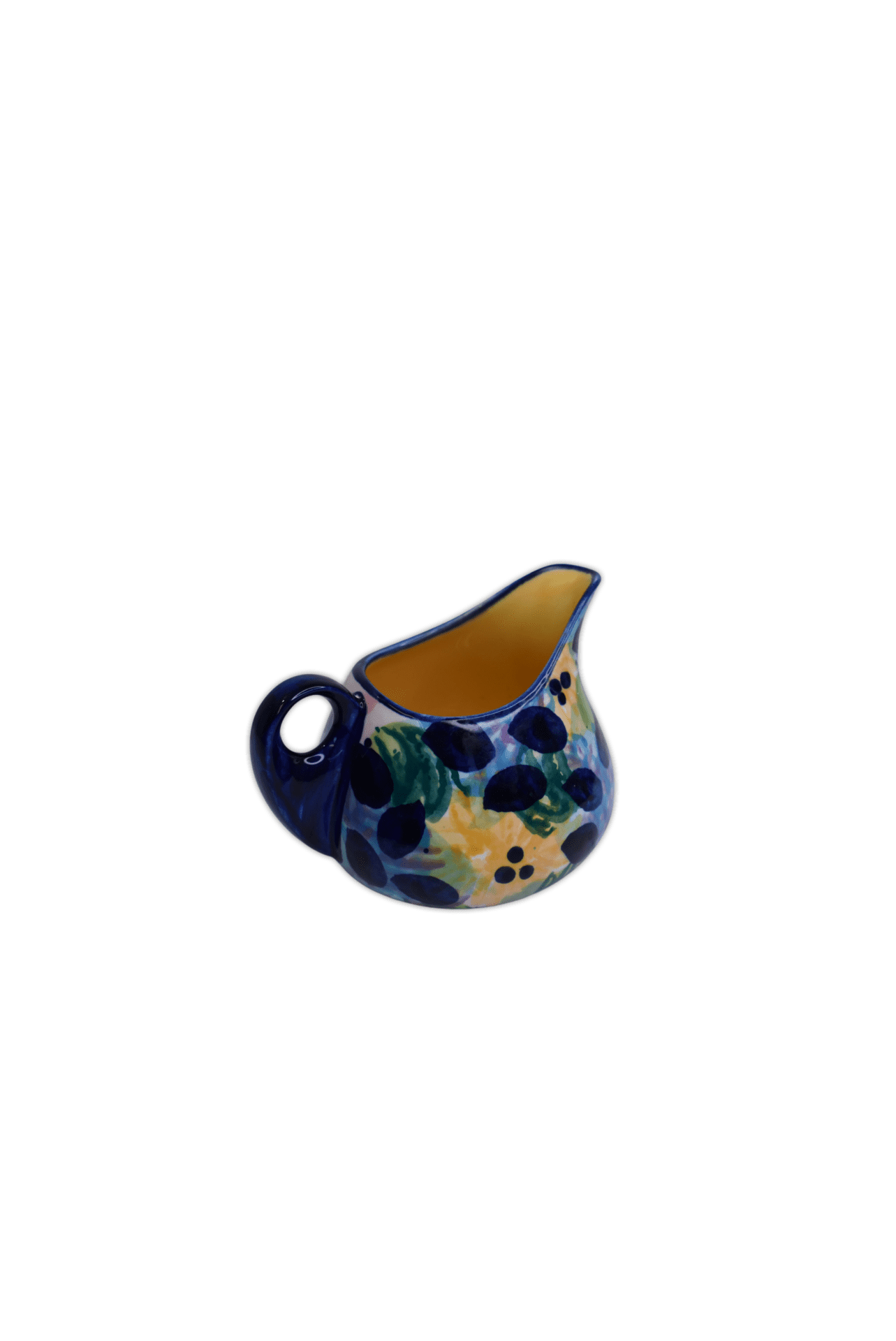 Small gravy jug for your home featuring a multicoloured floral glaze and yellow inside.