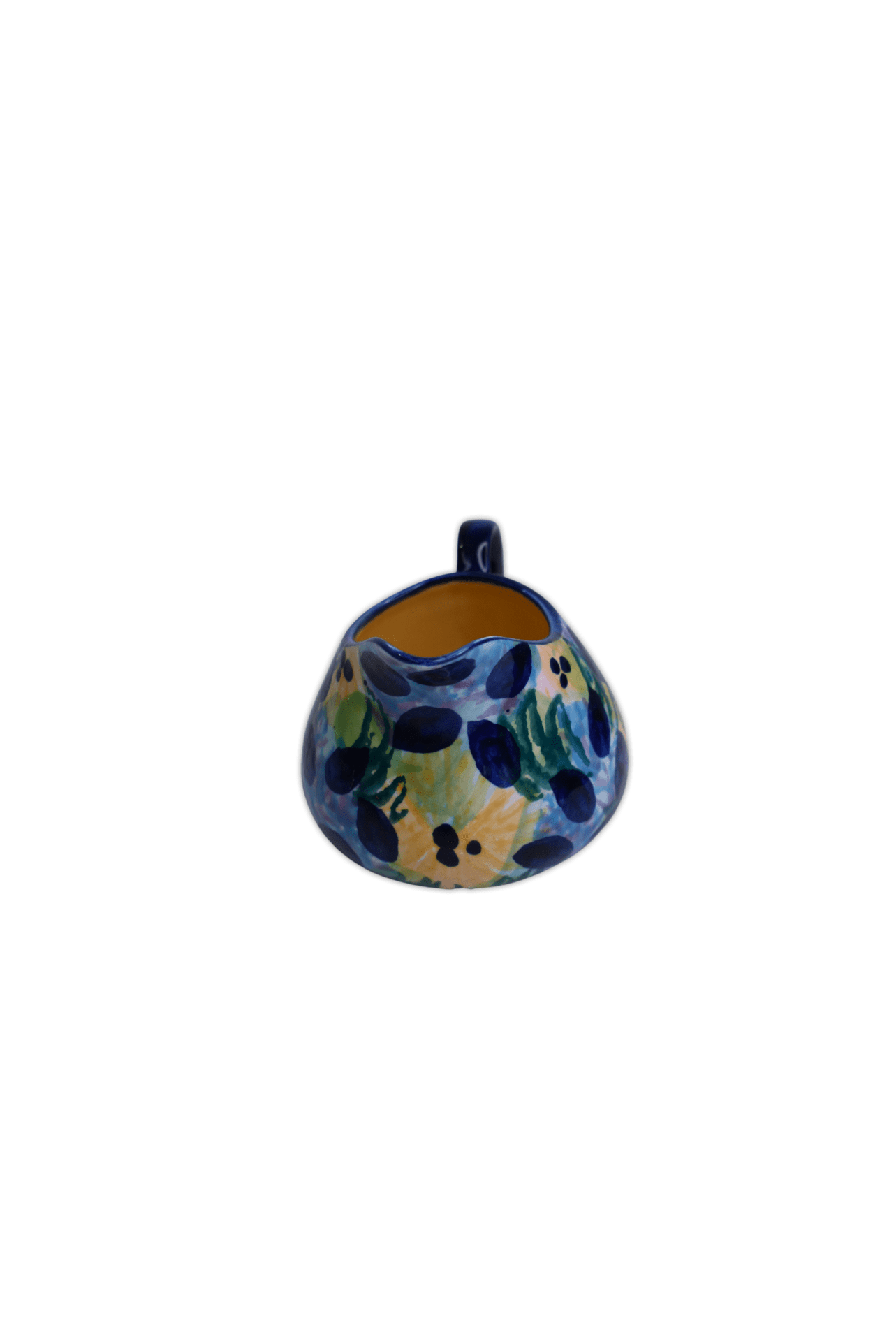 Small gravy jug for your home featuring a multicoloured floral glaze and yellow inside.