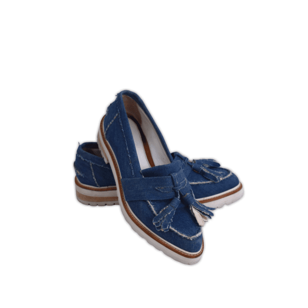 Collaboration between Beau Coop and Karen Walker, chunky everyday loafer featuring a contrast rubber sole with a decorative tie at the toe front. Colour: Blue/ White Size: EU 36