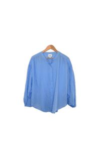 Light weight Blouse featuring a yoke with gathered fullness, long sleeves and a mandarin collar. 