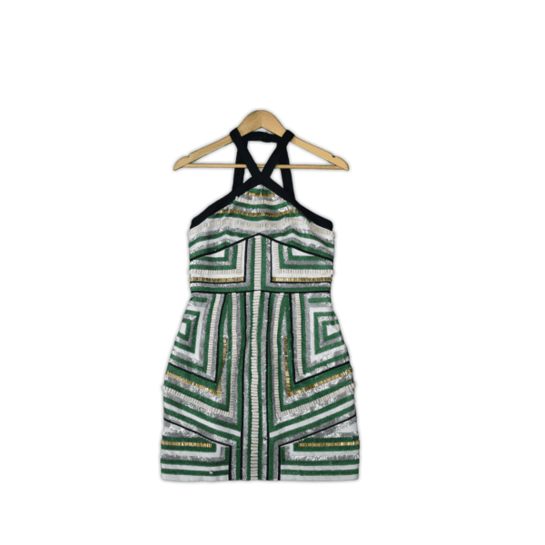 Mini dress with a sleeveless design featuring a beaded geometric pattern, halter neck, and center back zip. 