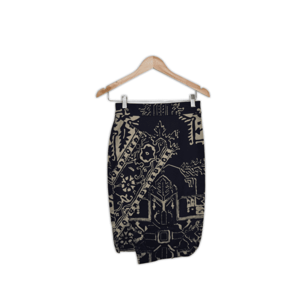 Wrap style skirt with center back zip and patterned fabric. 
