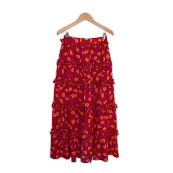Vibrant tiered maxi skirt with ruffle detailing.  Small, patterned pink skirt with orange pattern.